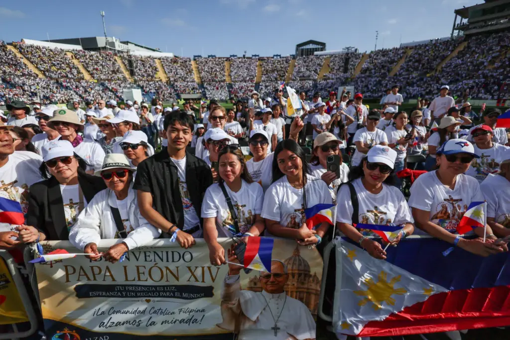 People gather at the Gran Canaria Stadium, in Las Palmas de Gran Canaria, to attend a Holy Mass with Pope Leo XIV during his apostolic journey, on the island of Gran Canaria, Spain June 11, 2026. REUTERS/Yara Nardi